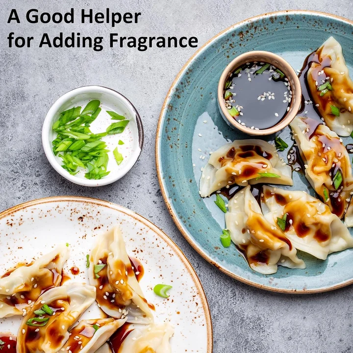 Pan-fried dumplings with a dark vinegar dipping sauce